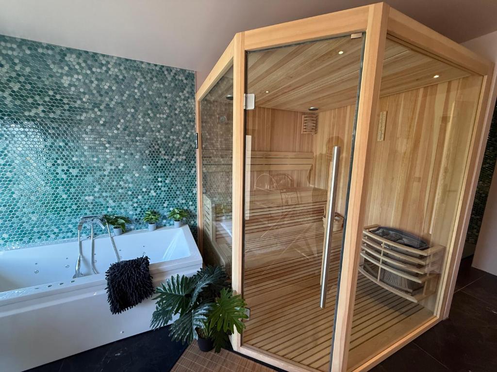 Postel nebo postele na pokoji v ubytování Chalet avec Spa Magnifique vue