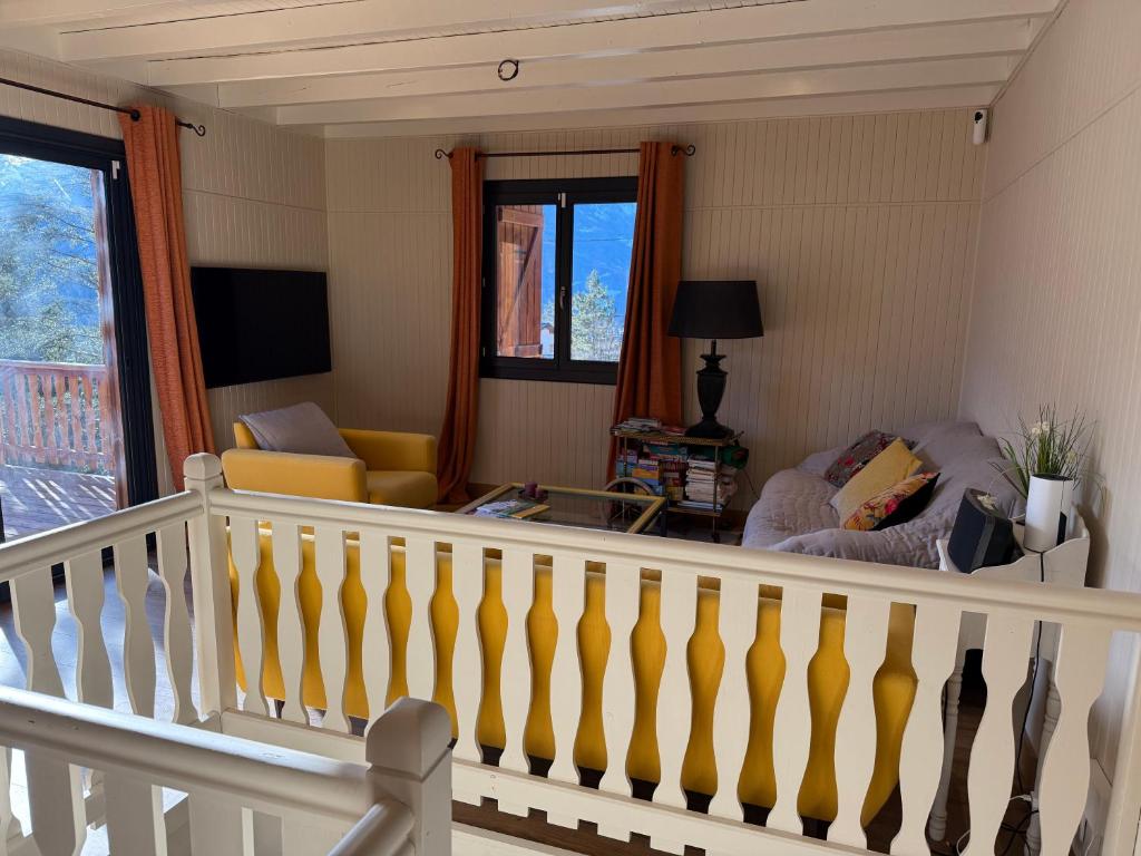 TV a/nebo společenská místnost v ubytování Chalet avec Spa Magnifique vue