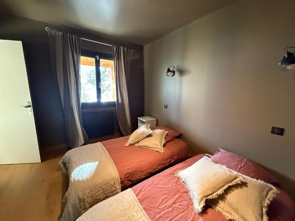 Postel nebo postele na pokoji v ubytování Chalet avec Spa Magnifique vue