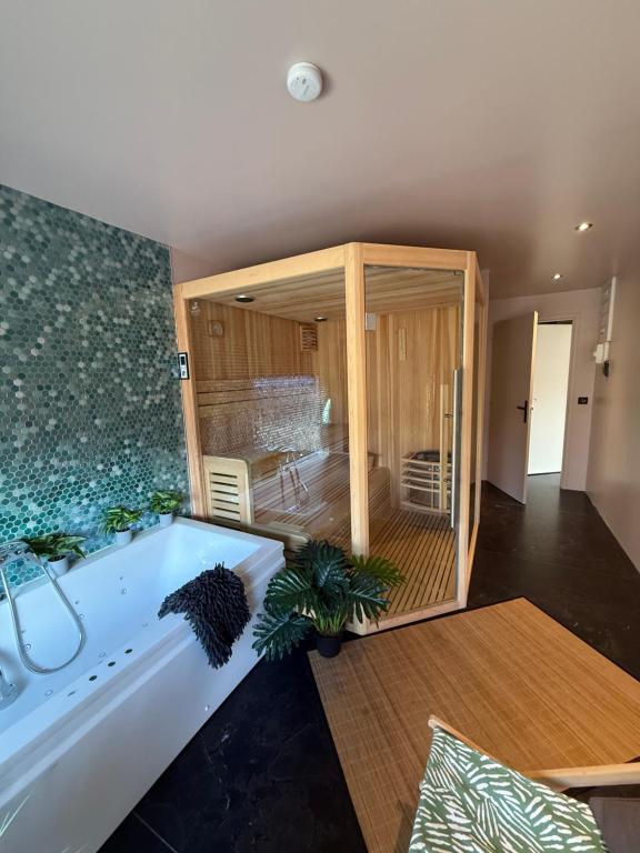 Postel nebo postele na pokoji v ubytování Chalet avec Spa Magnifique vue