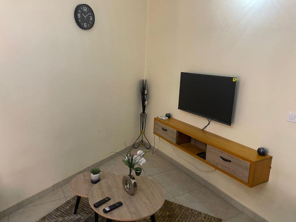 TV a/nebo společenská místnost v ubytování The Nest