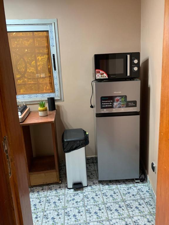 Kuchyň nebo kuchyňský kout v ubytování The Nest