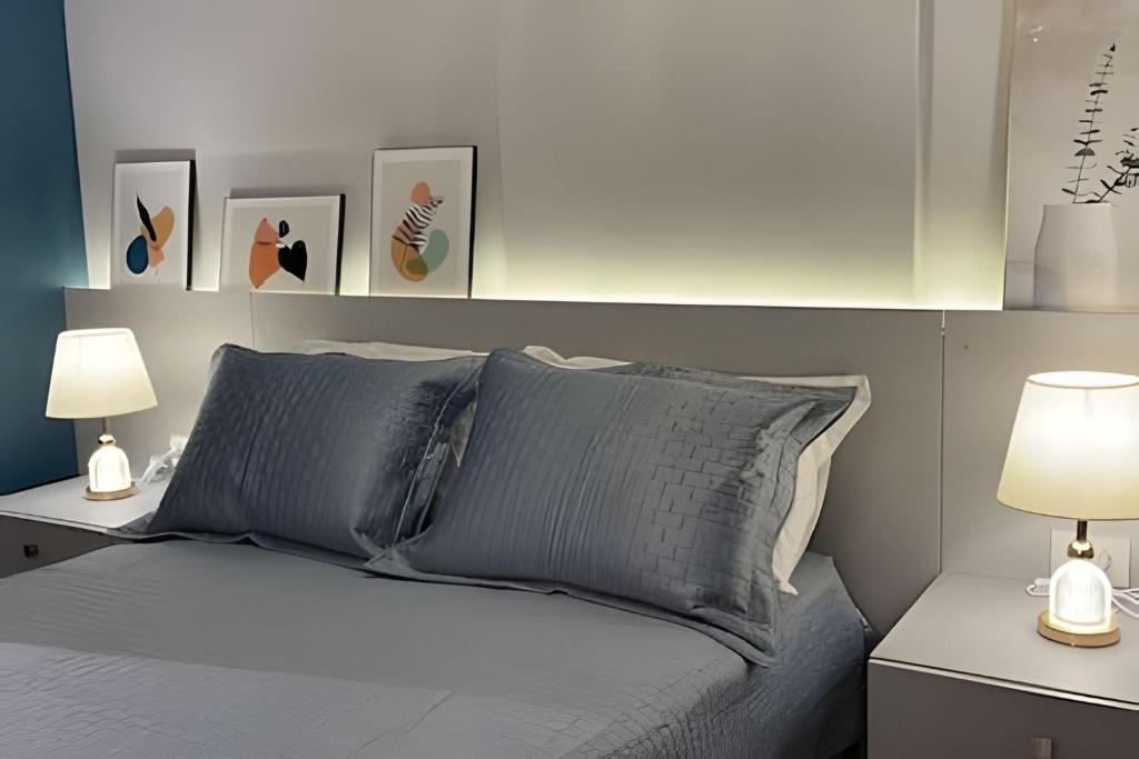 Postel nebo postele na pokoji v ubytování Way F5- Maravilhoso Flat para 3 pessoas, Tambaú