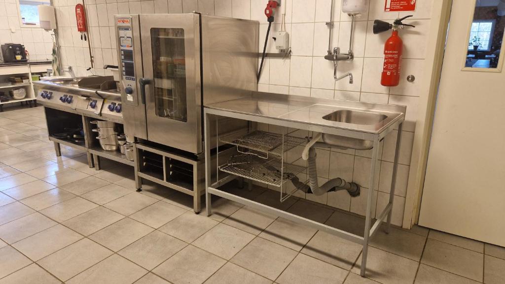 Kuchyň nebo kuchyňský kout v ubytování Hotel Dalhem