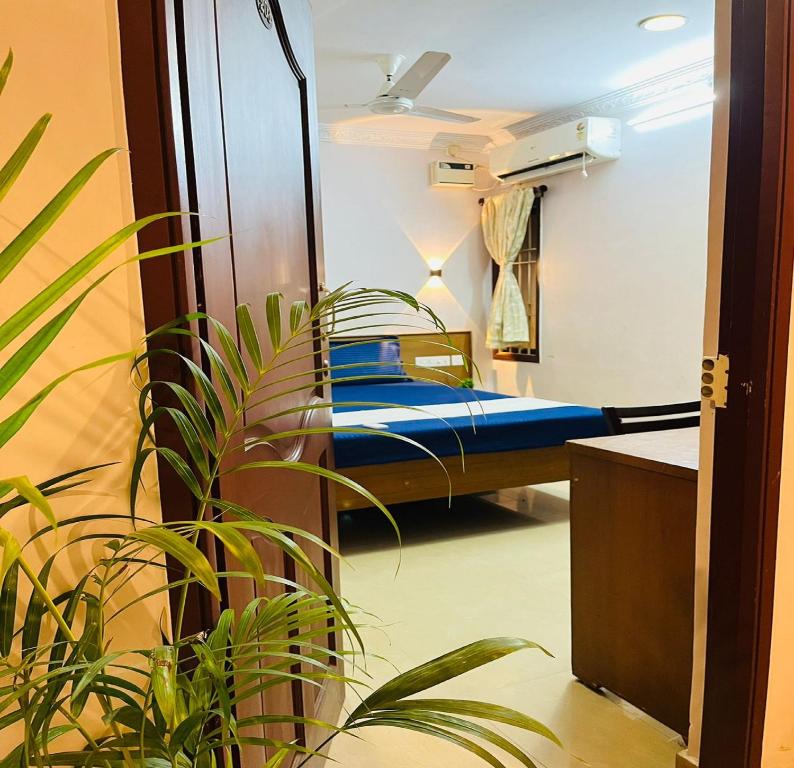 Postel nebo postele na pokoji v ubytování Nest Budget Inn
