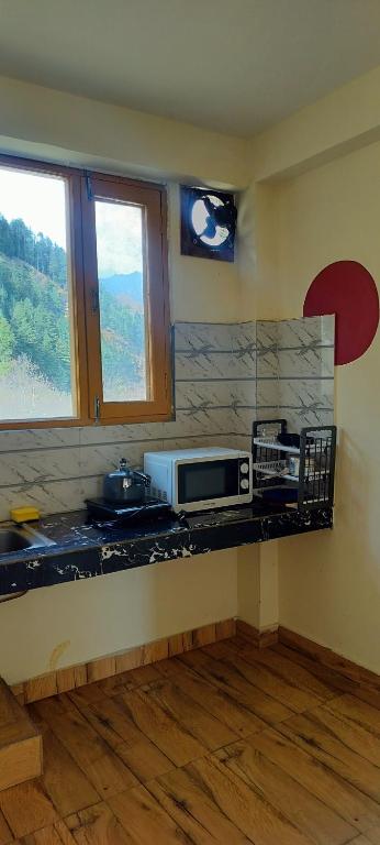 Kuchyň nebo kuchyňský kout v ubytování Starway Homes