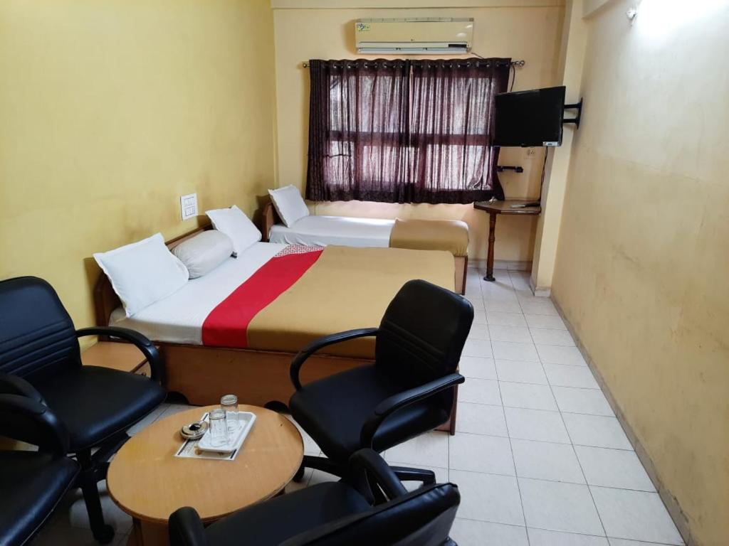 Postel nebo postele na pokoji v ubytování Hotel Ten