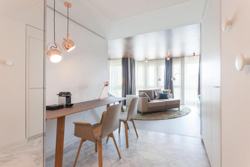 Posezení v ubytování EMA House Hotel Suites
