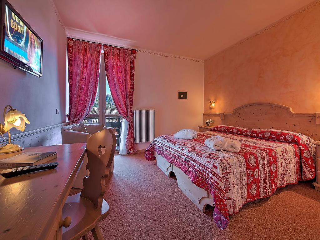 Ein Bett oder Betten in einem Zimmer der Unterkunft Al Posta Hotel 1899