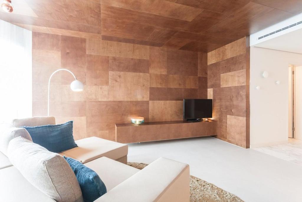 TV a/nebo společenská místnost v ubytování EMA House Hotel Suites