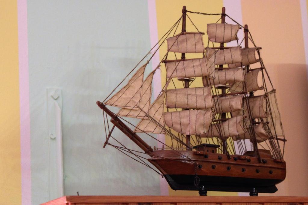 a model of a pirate ship hanging on a wall at Discover Italy in Tignes