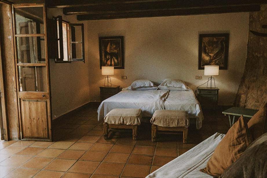 Postel nebo postele na pokoji v ubytování Agroturismo Can Torna AG178