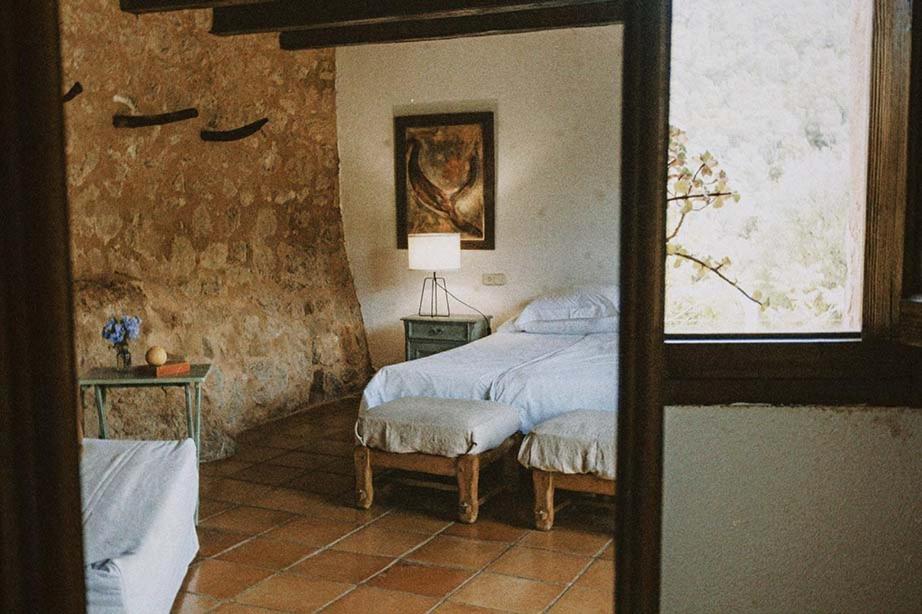 Postel nebo postele na pokoji v ubytování Agroturismo Can Torna AG178