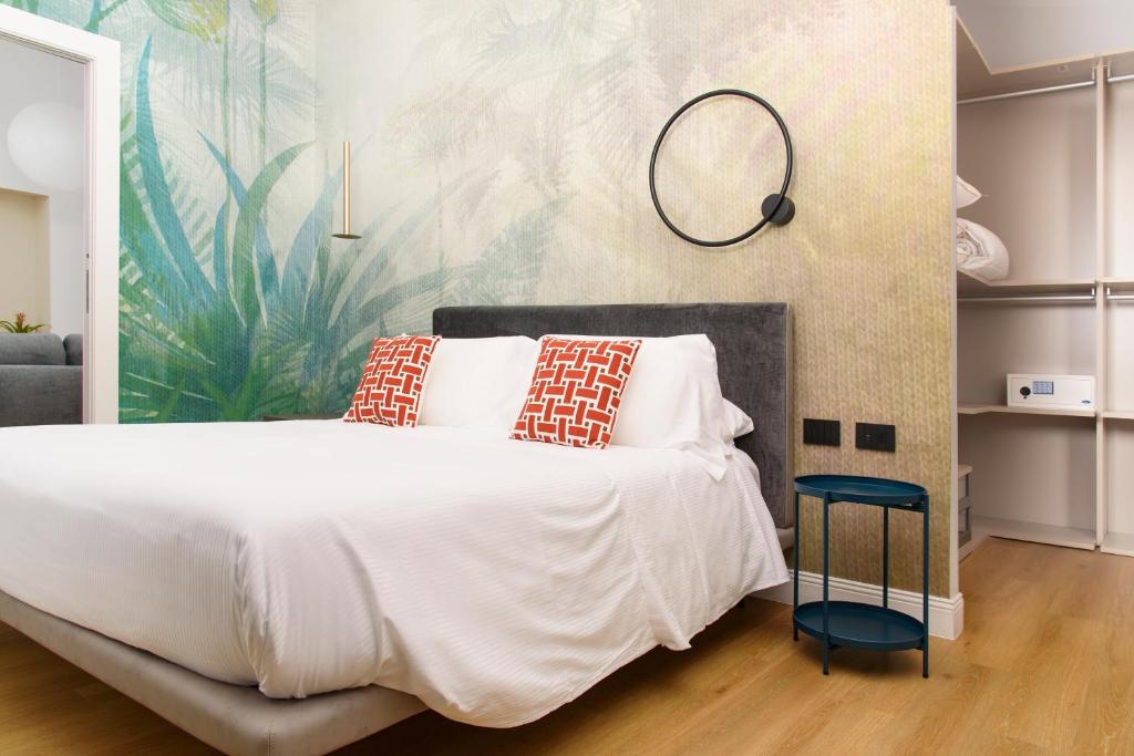 Postel nebo postele na pokoji v ubytování Vesuvius Palace Aparthotel