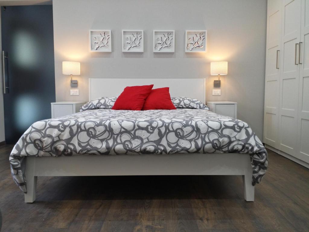 Łóżko lub łóżka w pokoju w obiekcie Appartamento Elegante