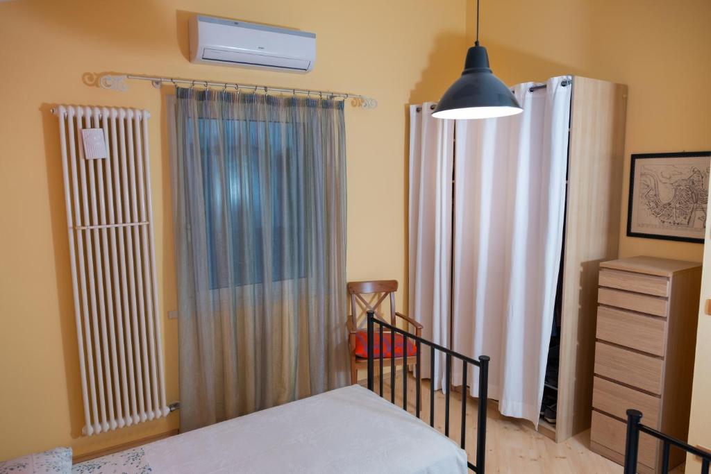 Postel nebo postele na pokoji v ubytování Rosa Tea B&B