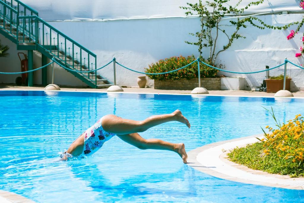Bazén v ubytování Costa del Salento - CDSHotels nebo v jeho okolí