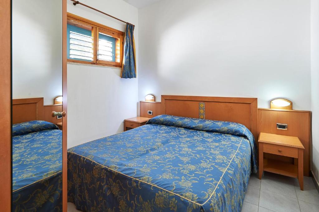 Postel nebo postele na pokoji v ubytování Costa del Salento - CDSHotels