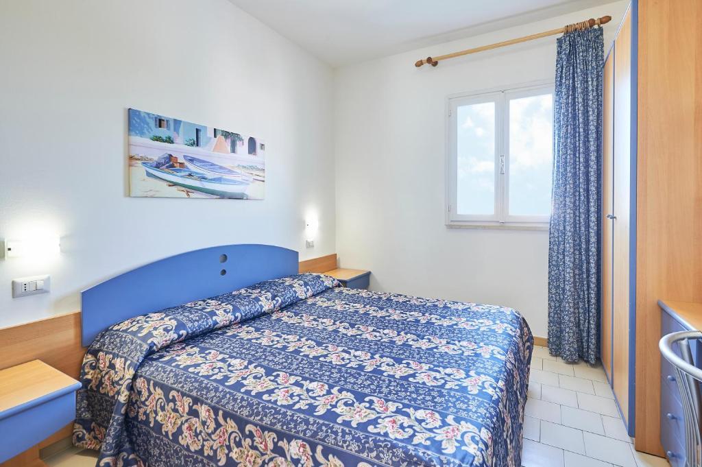 Postel nebo postele na pokoji v ubytování Costa del Salento - CDSHotels
