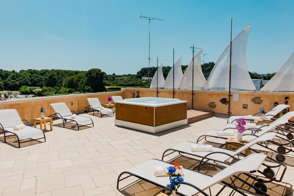 Bazén v ubytování Corte Di Nettuno - CDSHotels nebo v jeho okolí