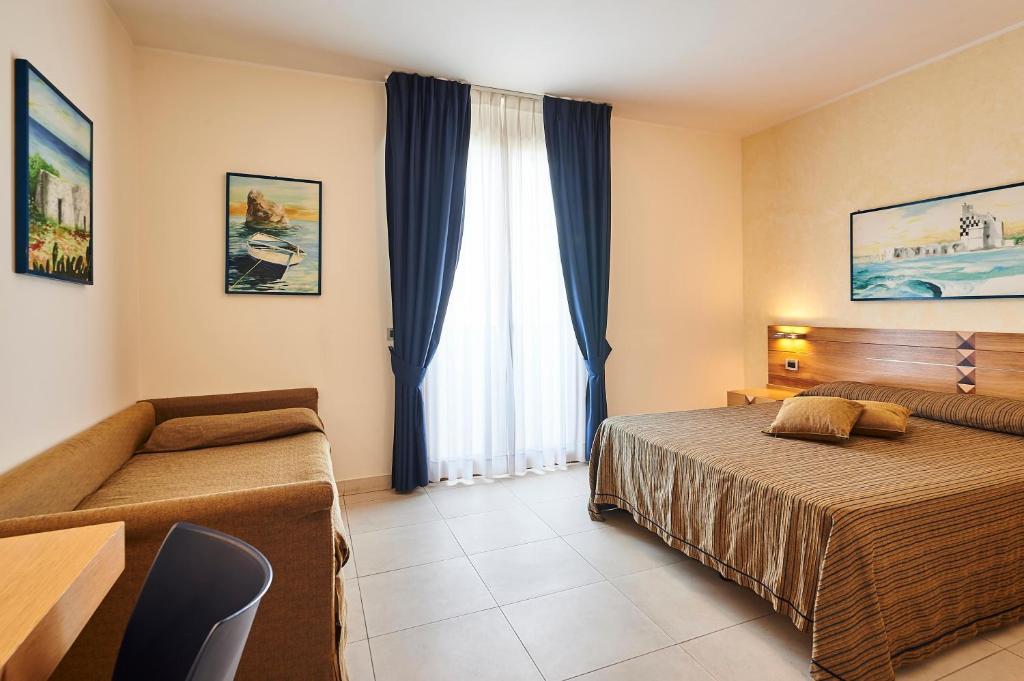 Postel nebo postele na pokoji v ubytování Costa del Salento - CDSHotels