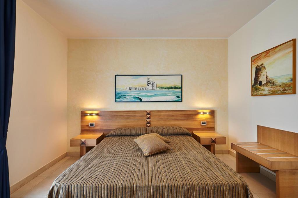 Postel nebo postele na pokoji v ubytování Costa del Salento - CDSHotels