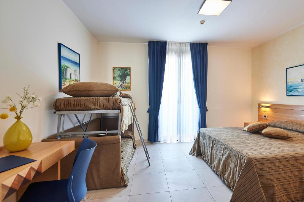 Postel nebo postele na pokoji v ubytování Costa del Salento - CDSHotels