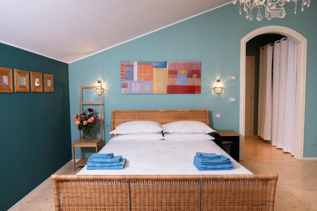 Postel nebo postele na pokoji v ubytování Rosa Tea B&B