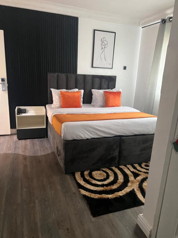 Postel nebo postele na pokoji v ubytování Florence Hotel and suites