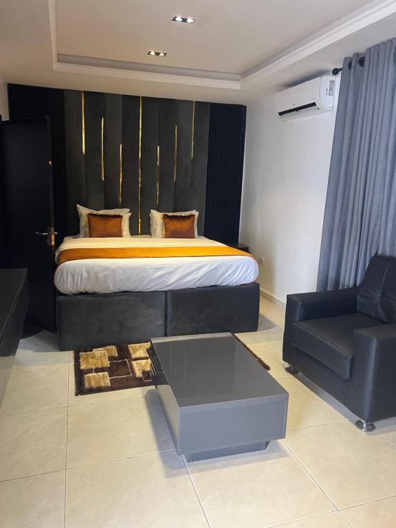 Postel nebo postele na pokoji v ubytování Florence Hotel and suites