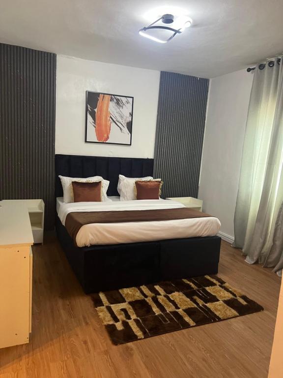 Postel nebo postele na pokoji v ubytování Florence Hotel and suites