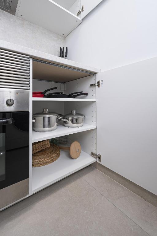 Kuchyň nebo kuchyňský kout v ubytování Madrid Centric Suites