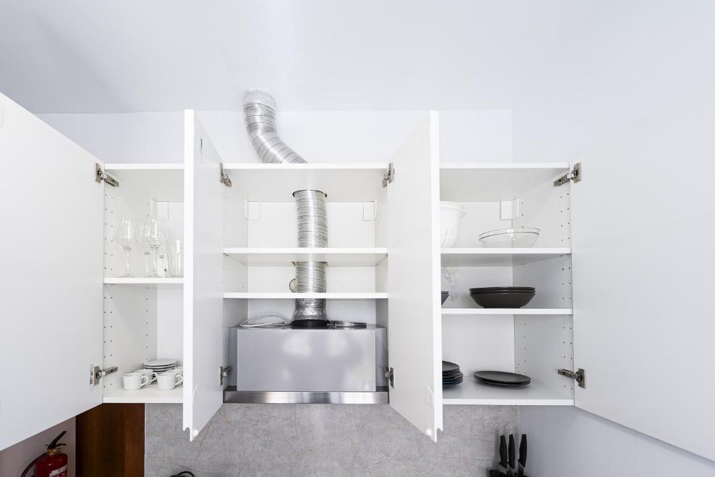 Kuchyň nebo kuchyňský kout v ubytování Madrid Centric Suites