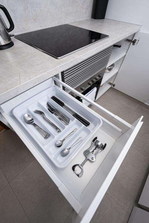 Kuchyň nebo kuchyňský kout v ubytování Madrid Centric Suites