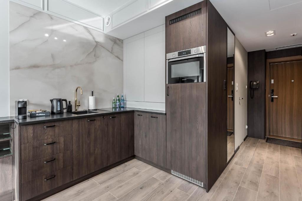 Kuchyňa alebo kuchynka v ubytovaní Rent like home - Apartamenty w Deo Plaza