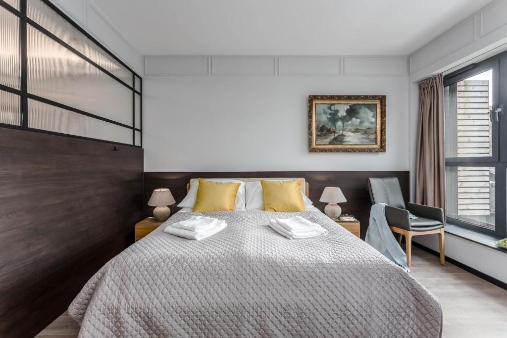 Posteľ alebo postele v izbe v ubytovaní Rent like home - Apartamenty w Deo Plaza