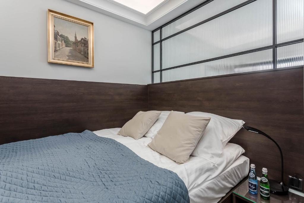 Posteľ alebo postele v izbe v ubytovaní Rent like home - Apartamenty w Deo Plaza