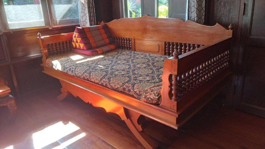 Postel nebo postele na pokoji v ubytování เรือนแฝด Brook view