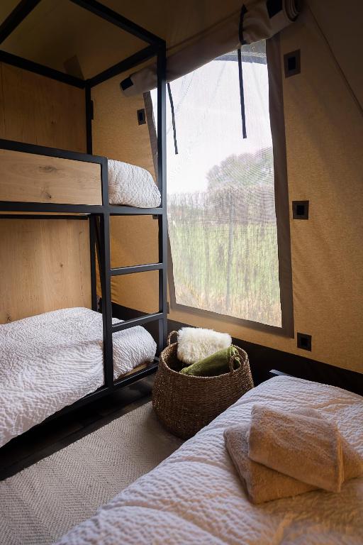 Postel nebo postele na pokoji v ubytování Crossover lodge de la vallée