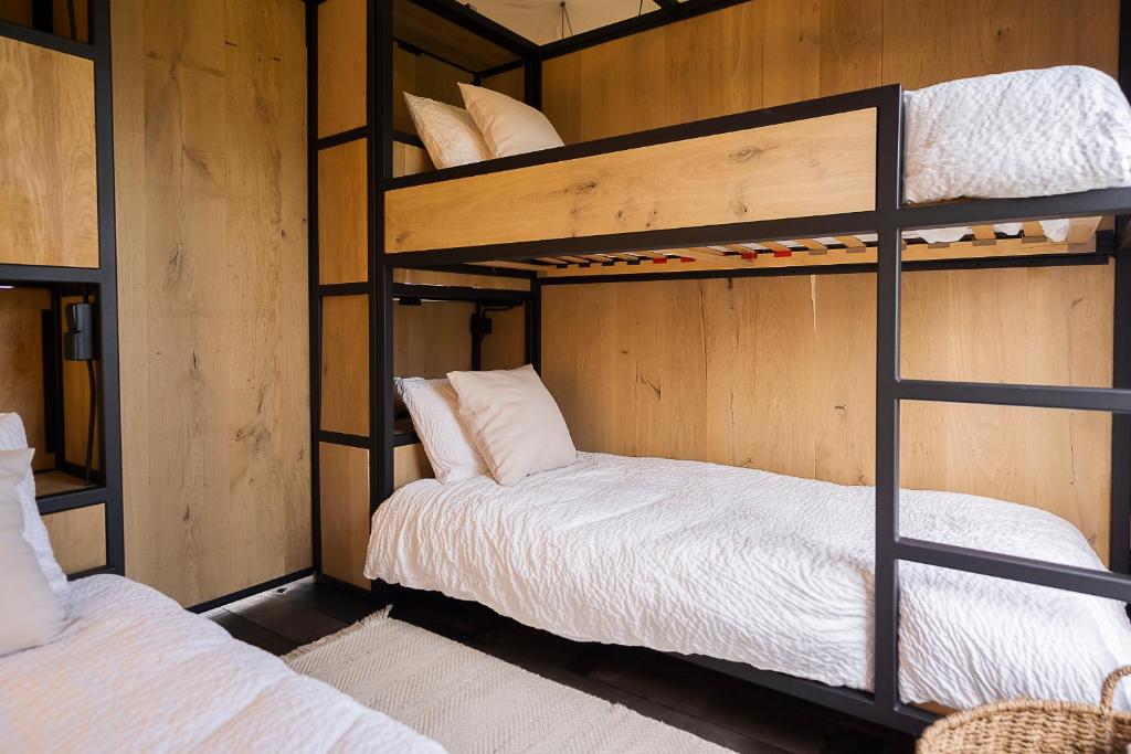 Postel nebo postele na pokoji v ubytování Crossover lodge de la vallée