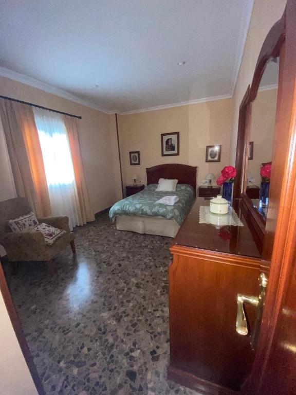 Posteľ alebo postele v izbe v ubytovaní Casa Rural Pariente