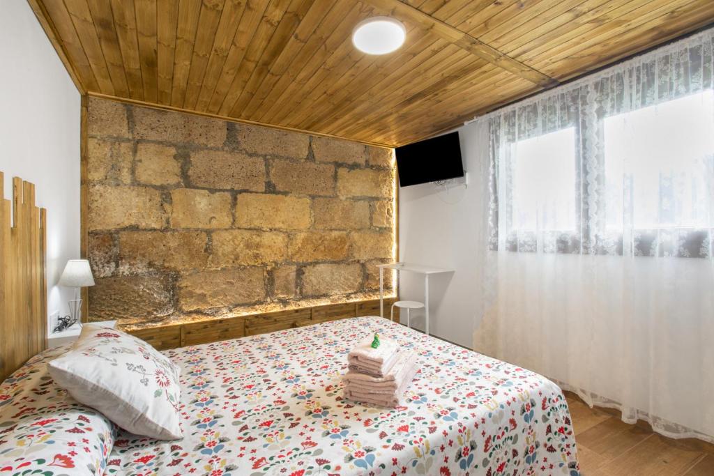 Postel nebo postele na pokoji v ubytování El Hogar de Ireneo B