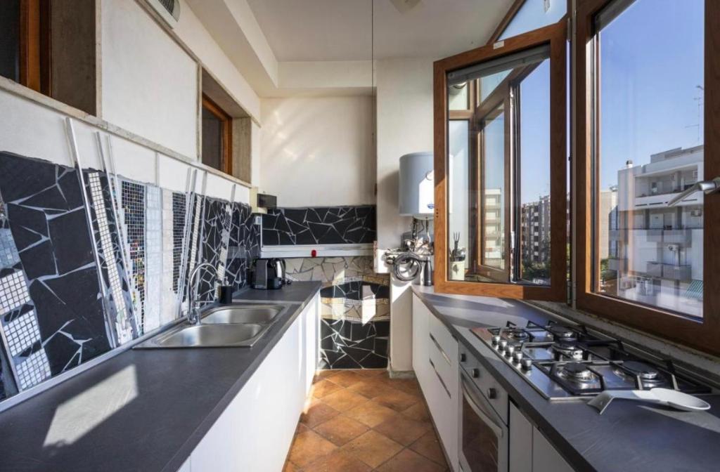 Kuchyň nebo kuchyňský kout v ubytování Salesiani Room A