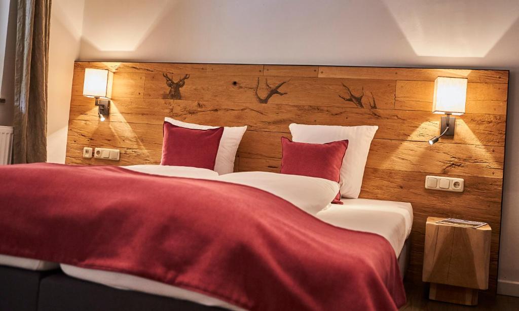Postel nebo postele na pokoji v ubytování Hotel Schachner