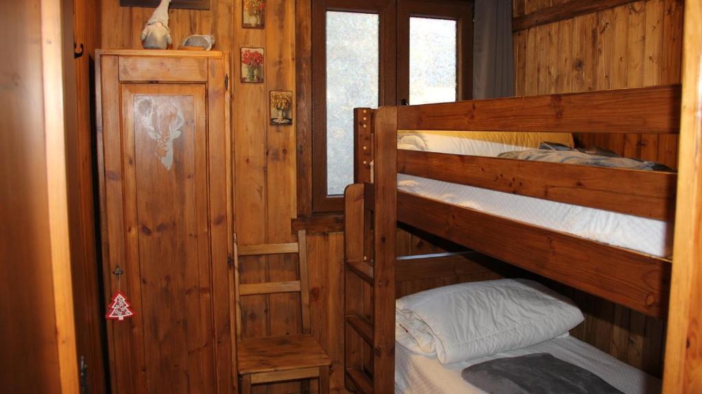 Postel nebo postele na pokoji v ubytování Apartment Les Guides