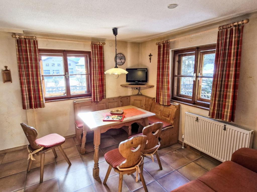 A seating area at Apartment Haflingerhof Almrose by Interhome