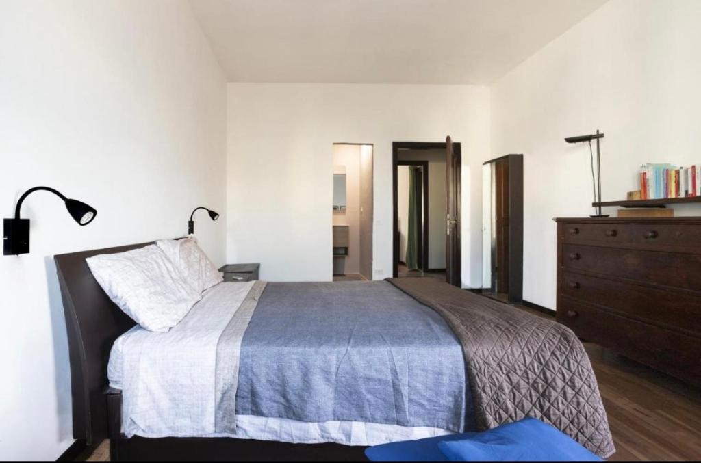Postel nebo postele na pokoji v ubytování Salesiani Room A
