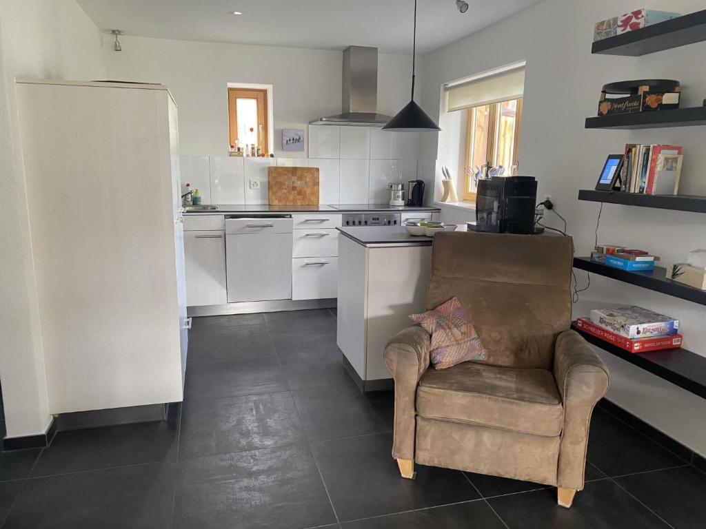 Kuchyň nebo kuchyňský kout v ubytování Apartment Tgesa Grischa by Interhome