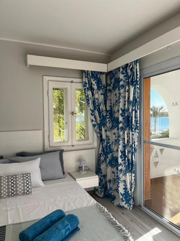 Postel nebo postele na pokoji v ubytování Domina Coral Bay Sultan Vista Mare