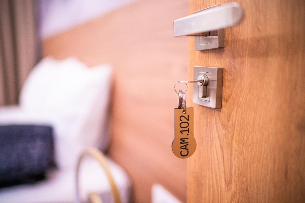 Postel nebo postele na pokoji v ubytování Pensiunea A-ROSA SKI RESORT Obarsia Lotrului